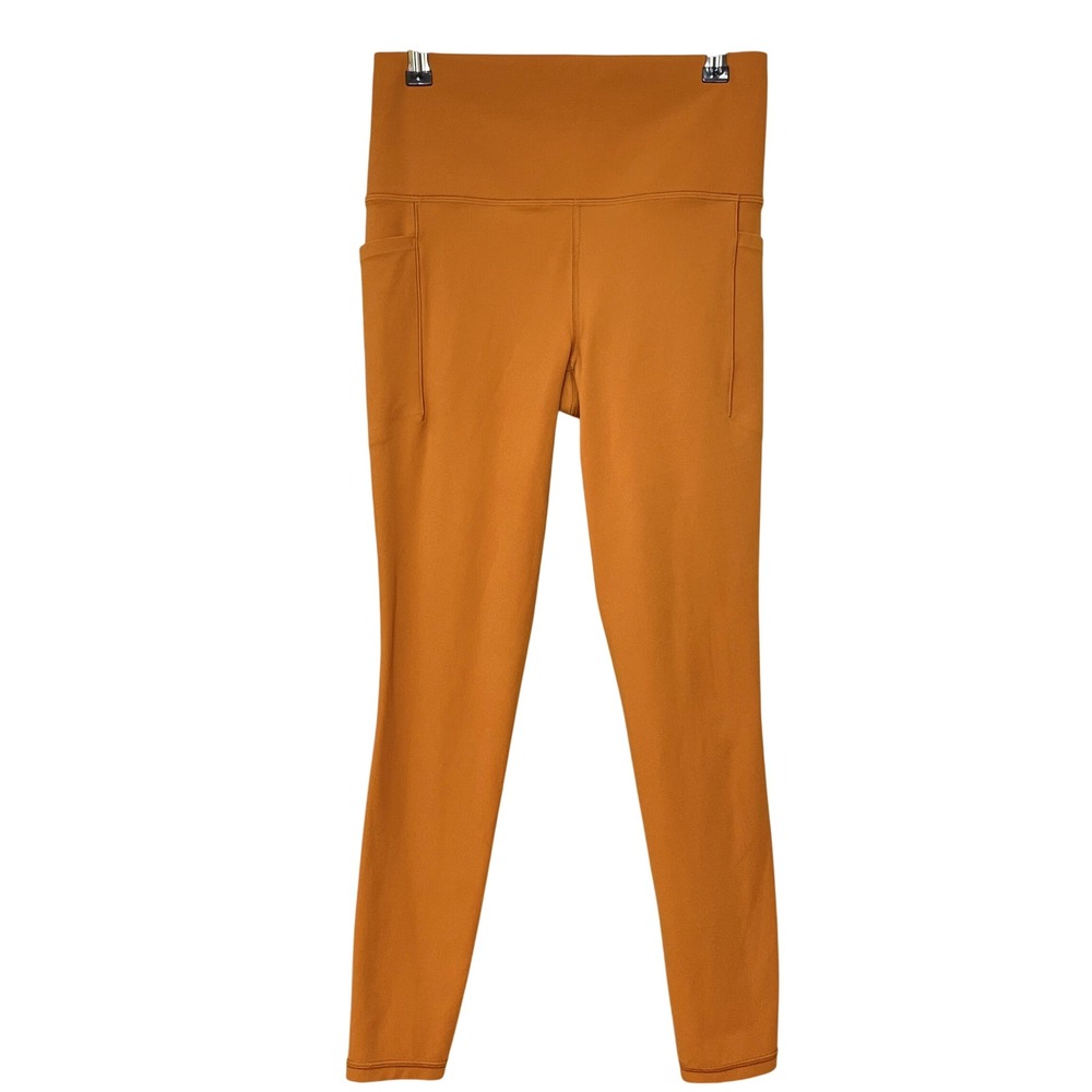 Athleta Salutation Stash Pocket II Tight Legging Women Size Small Mustard Yoga
